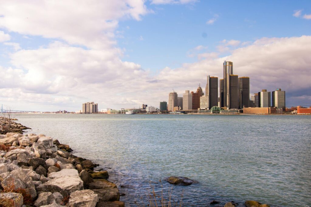 The Detroit riverfront with the downtown Detroit skyline along the water.