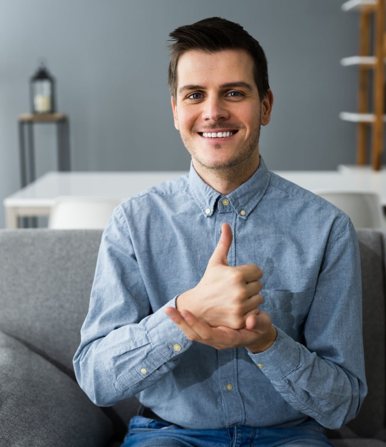 A person signing to camera during a video call