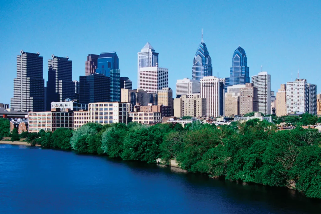 The Philadelphia skyline rising above the Schuylkill River waterfront.