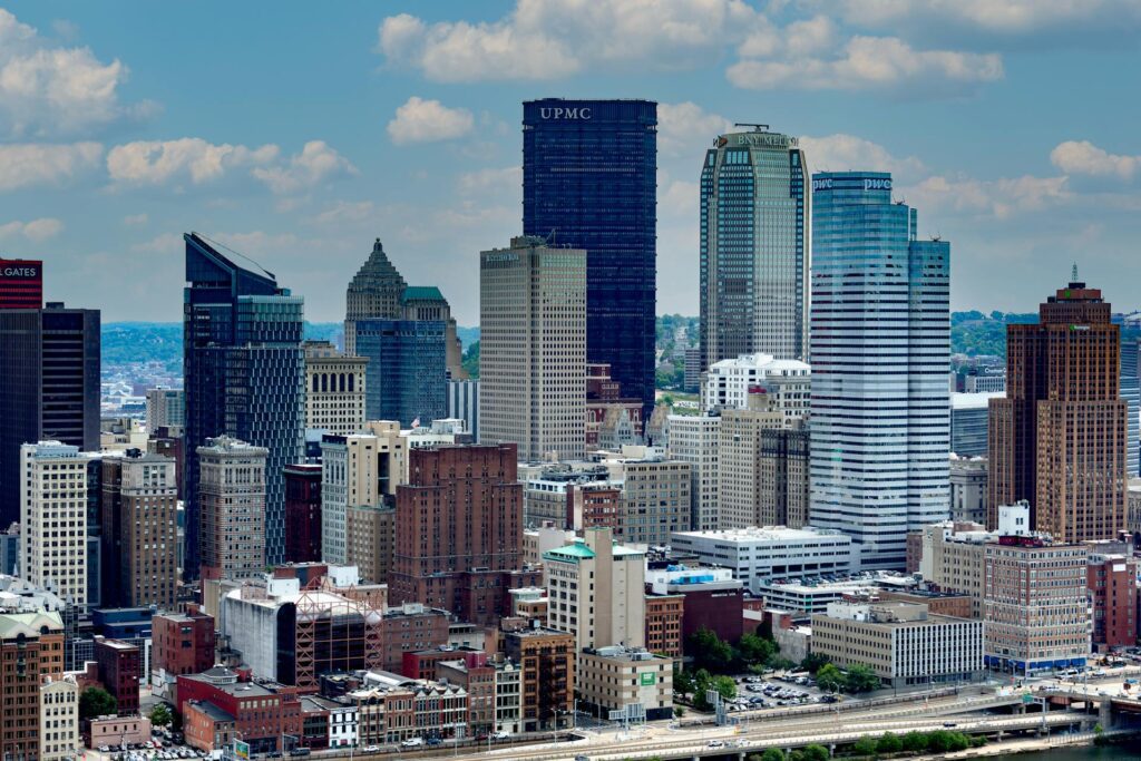 The Pittsburgh skyline at the meeting of the city’s three rivers, with bridges in the foreground.