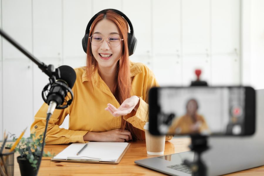 Podcast recording setup with microphone and headphones