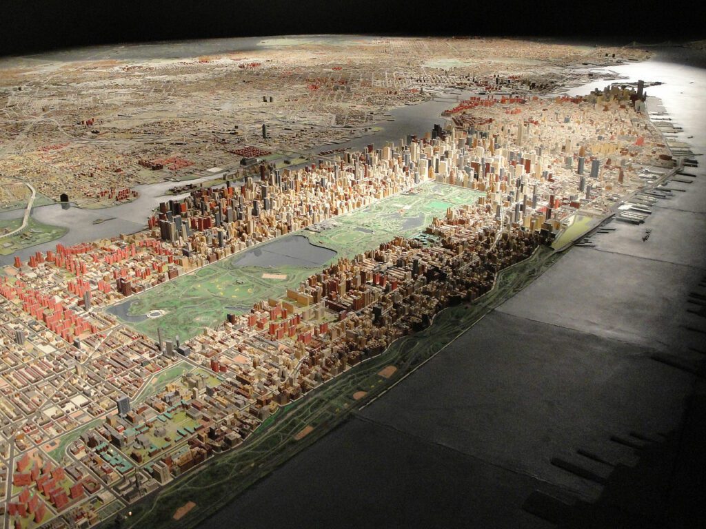 The Panorama of the City of New York at the Queens Museum: a room-sized scale model of the five boroughs, with Manhattan and Central Park lit from above.