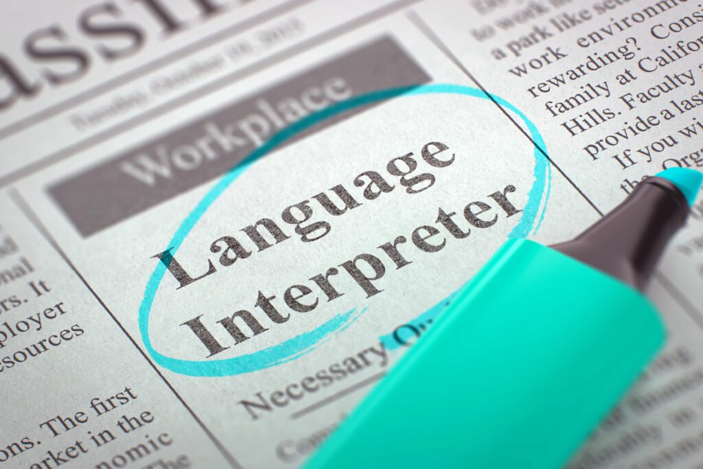 A newspaper classified ad with 'Language Interpreter' circled in teal marker.