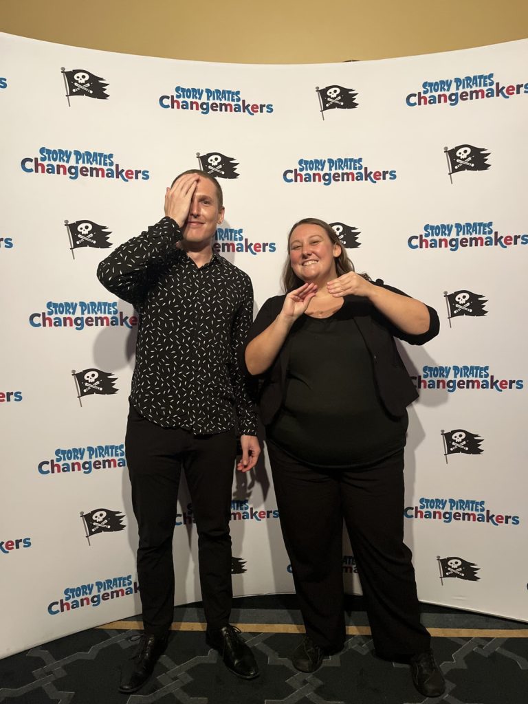 Sign language interpreters, Shelby and Tyler, provide community-oriented interpreting services via ICS's Village Hands program for Story Pirates Changemakers.