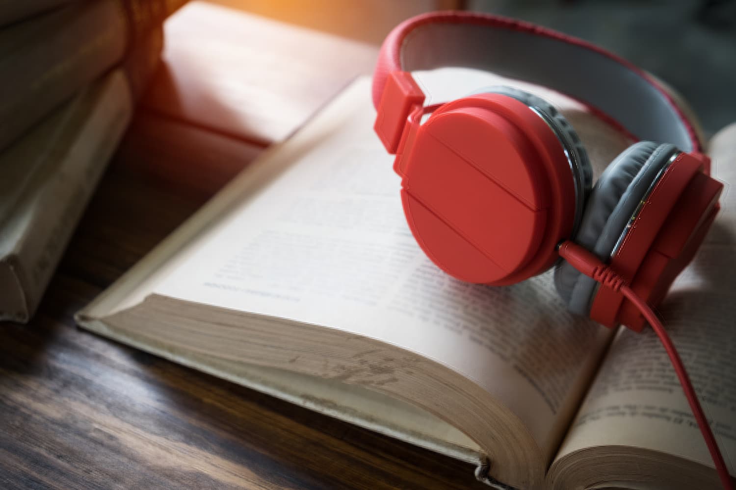 audiobook books table with headphones