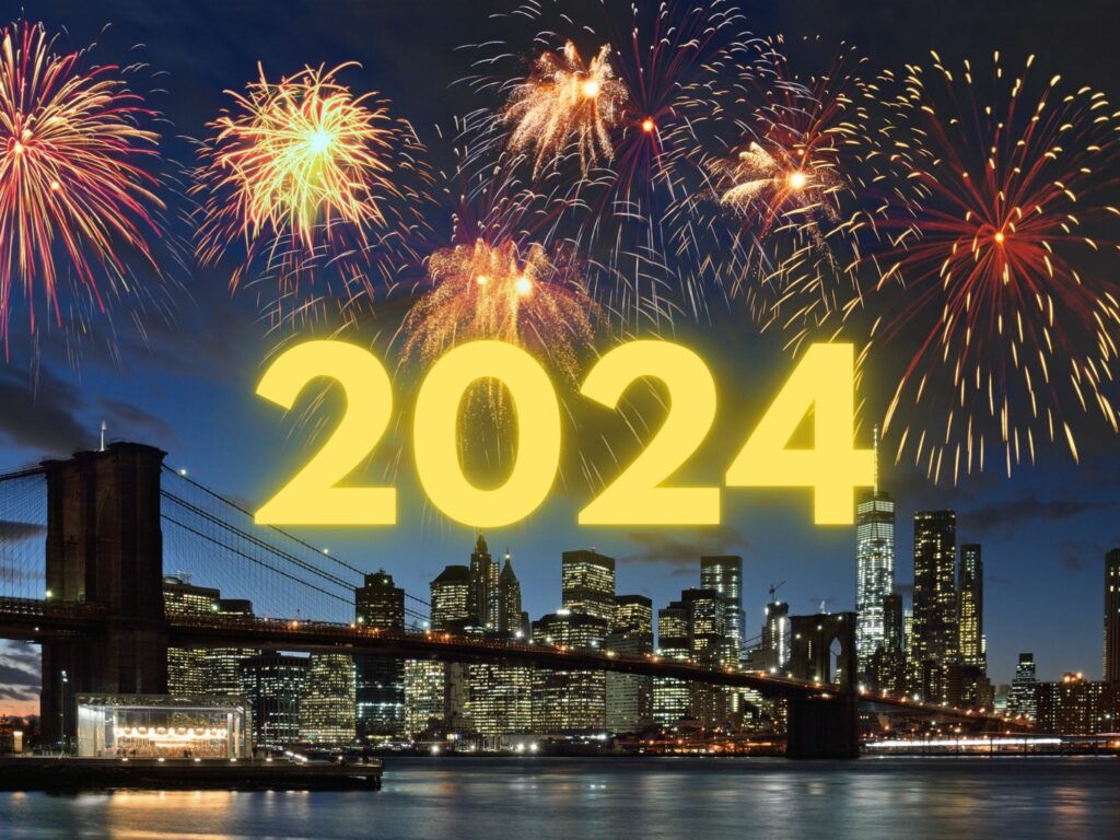 The NYC cityscape at dusk has fireworks in the sky and the text 2024.